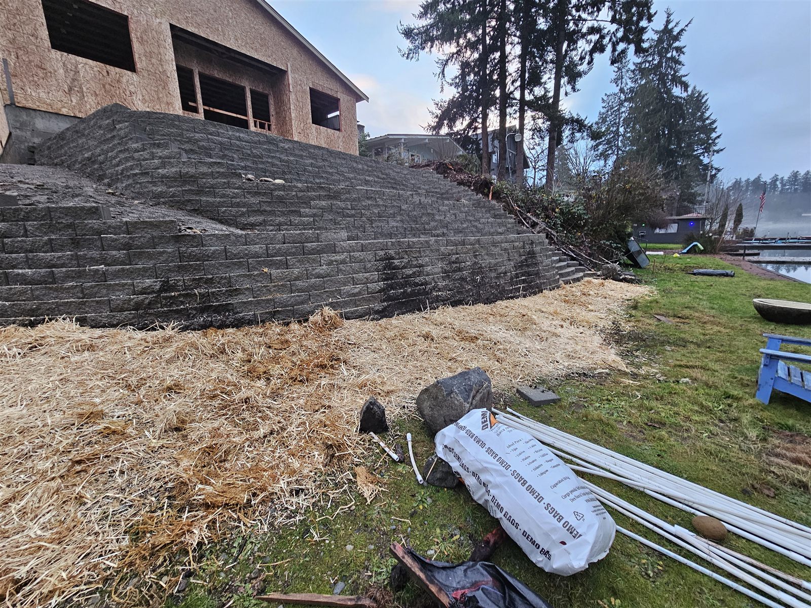 Finished block retaining wall on a slope